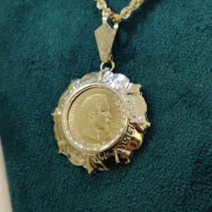 Pendentif porte-pièce 10fr grec - Or 18k
